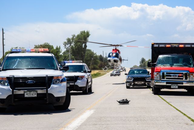 Bell 407 (N912GX) - North Colorado Med Evac "MedEvac 2" landing on Hwy 287 south of Longmont,CO