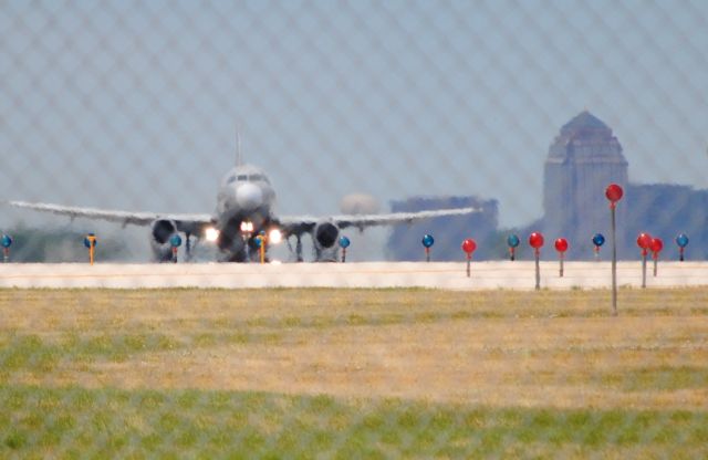 — — - At the National Rental Car gate; stepped out to get some take-offs.  One of the best spots in the country if controllers are cooperating:-)