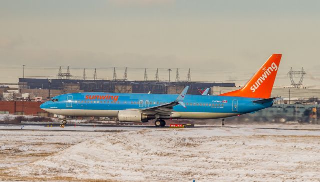 Boeing 737-800 (C-FNAD) - Sunwing 730 rolls down runway 23 bound for Jamaica