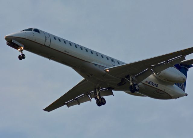 N14568 — - An ExpressJet {United Express} Embraer ERJ-145LR, N14568, approaches Runway 24 Left at the Dayton International Airport on July 25, 2015. It is shown arriving from Newark and descending from 32,000 feet.