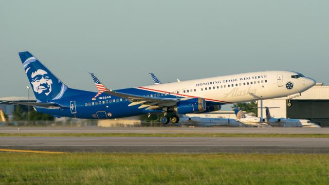 Boeing 737-900 (N265AK) - Alaska's Honoring Those Who Serve livery departing KIAH