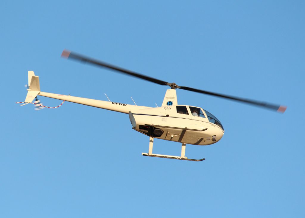 Robinson R-44 (VH-WDI) - Coming into land after an afternoon local flight 15/08/2018