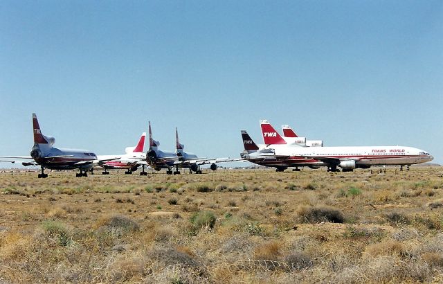 Lockheed L-1011 TriStar (N31013) - KIGM - possibly April 1998 or 1999. traveling back from PHX via Wickenburg and I-40 - a sad sight to see the TWA L1011 jets at Kingman AZ in storage for breaking up. These were fairly clean this day and probably had not been here for a very long time.