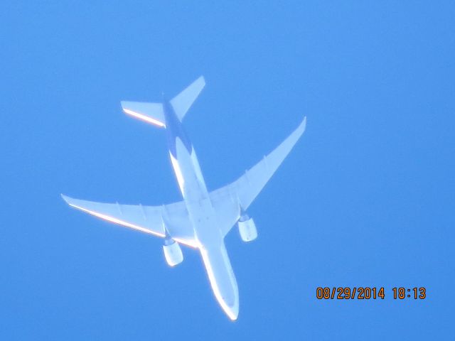 BOEING 777-200LR (N886FD) - FedEx flight 25 from MEM to SEA over Baxter Springs Ks (78KS)at 36k feet.