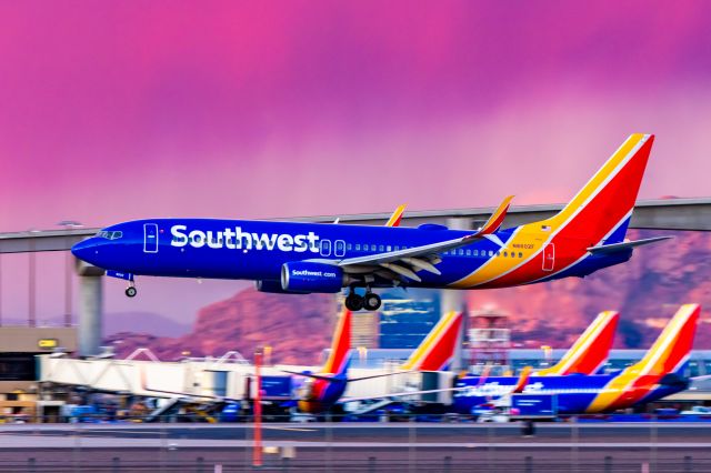 Boeing 737-800 (N8602F) - Southwest Airlines 737-800 landing at PHX on 12/13/22. Taken with a Canon R7 and Tamron 70-200 G2 lens.