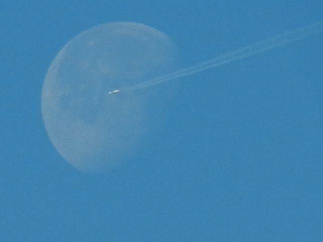 Airbus A321 (N328DN) - A Very Rare Encounter! A Delta Airlines Airbus A321 Is Caught COMPLETILY Overlapping The Moon! 