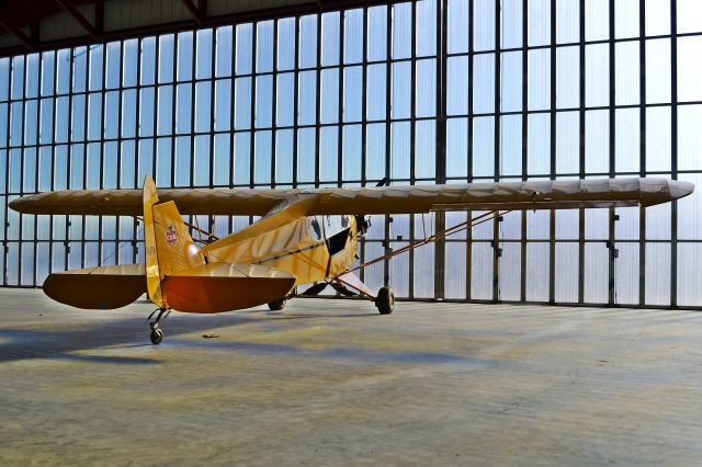 Piper NE Cub (N42TH) - Shot of a nice Piper Cub inside a hangar in Brady, Texas.