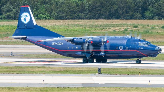 Antonov An-12 (UR-CGV) - UR-CGV turning off of Dulles Airport's runway 1C after a flight from San Bernardino