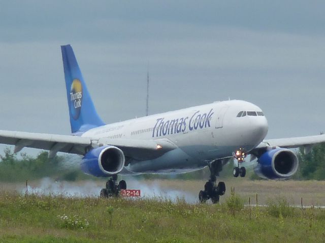 Airbus A330-300 (G-OJMC) - landing on 07