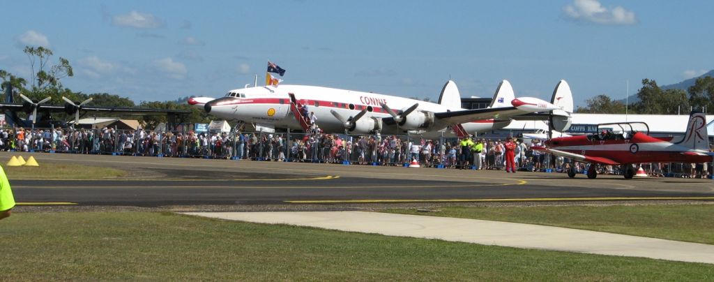 Lockheed EC-121 Constellation (VH-EAG) - Crowd favourite at the Coffs Air Show in 2007 - Connie VH-EAG. Alongside is the Black Cat PBY Catalina, with a Red Arrows display plane sliding past on taxiway.