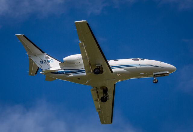 Cessna Citation Mustang (N2WG) - On short finals for RW29 in a gusty summer Nor'Wester.