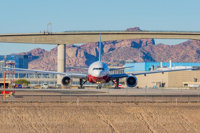 Boeing 777-200 (N867DA) - Arizona Cardinals 777-200 taxiing at PHX on 11/12/22. Taken with a Canon R7 and Tamron 70-200 G2 lens.