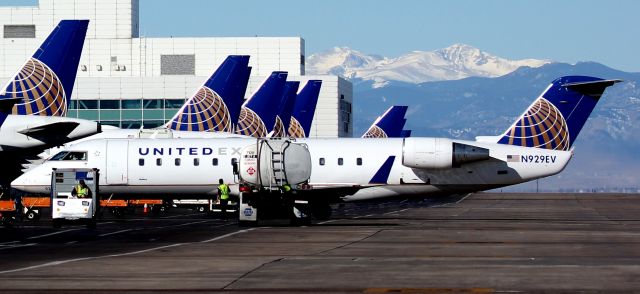 Canadair Regional Jet CRJ-200 (N929EV) - Mount Evans in the background.