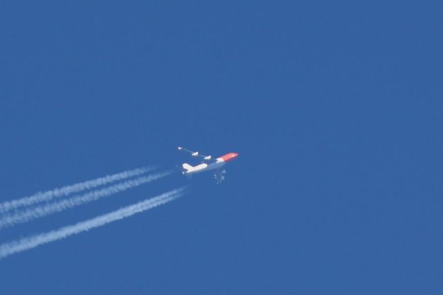 Boeing 747-400 (OO-THB) - TNT B747-400 flying over Boston Logan after departing JFK for Liege. 