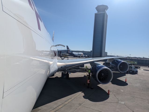 N863GT — - The last 747 ever built unloading on first time at O'Hare Airport. In Southeast Cargo Ramp.  South Tower in background.