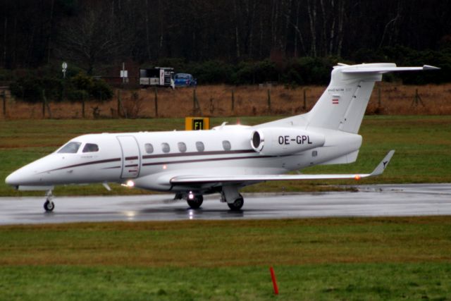 Embraer Phenom 300 (OE-GPL) - Springdale Air Service Phenom 300 backtracking rwy 06 on 11-Dec-17 heading for LFPB as SPG939.