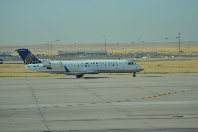 Canadair Regional Jet CRJ-200 (N935SW) - Taxiing to runway in DEN