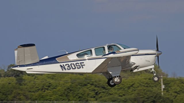 Beechcraft 35 Bonanza (N30SF) - Departing AirVenture 2023 on runway 18R 