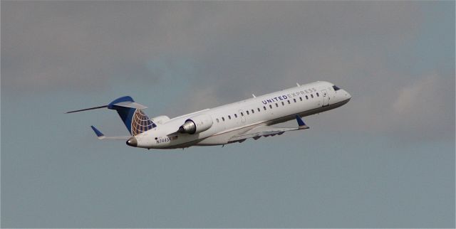 Canadair Regional Jet CRJ-700 (N744SK) - Departure from 12R to Chicago-OHare.