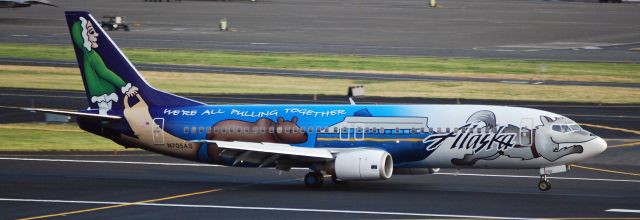 BOEING 737-400 (N705AS) - Alaska Airlines is marking the 50th anniversary of Alaska statehood with a Were all pulling together scheme applied to this Boeing 737-400 (N705AS, dubbed Spirit of Alaska Statehood). The winning design in a statewide Paint the Plane contest was created by 16-year-old Hannah Hamberg from Sitka. Aviation Technical Services of Everett, Washington, completed the complicated 21-color painting process, which took 14 days.