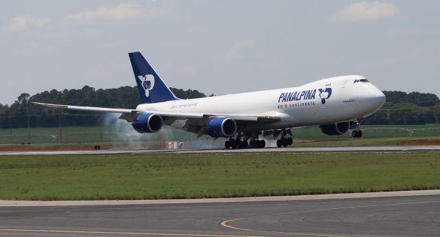 BOEING 747-8 (N850GT) - A Panalpina Boeing 747-8F touching down on Runway 36L at Jones Field, Huntsville International - September 2, 2016. Shot with a Canon T5 and a 75mm-300mm lens from just outside the taxiway perimeter fence along west Boeing road. 