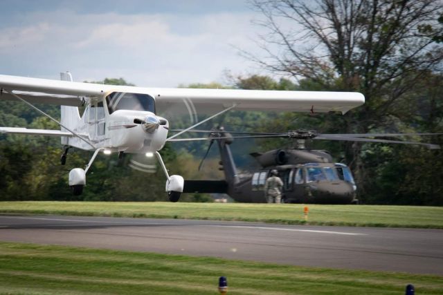 Cessna Centurion (N12LF) - Comp Air CA-6 landing at EAA fly in at Sky Manor (N40).