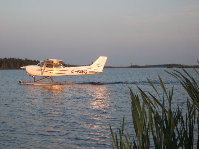 Cessna Skyhawk (C-FAVG) - A Cessna 172L prepares for departure on Deadman's Pond next to Gander International Airport.