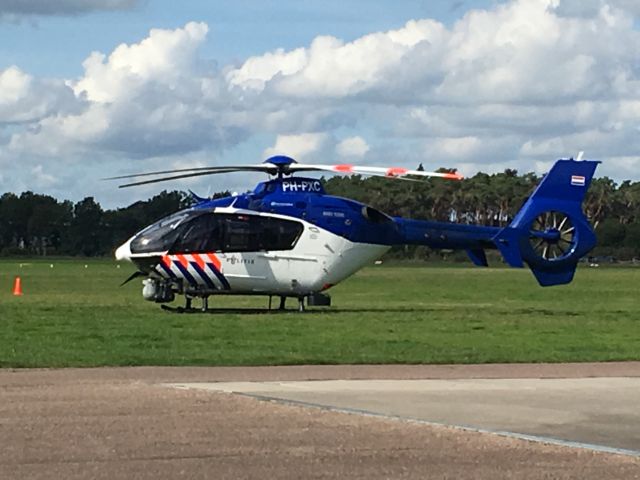 PH-PXC — - Police helicopter coming in for a fuel stop on EHHV