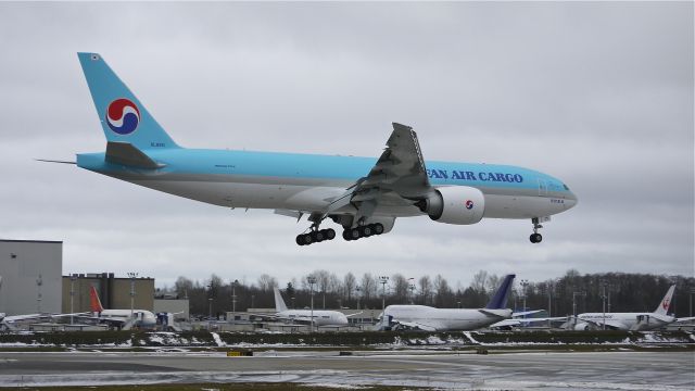 BOEING 777-200LR (HL8251) - BOE136 on final approach to runway 16R after receiving its paint at KPDX. Photographed 1/21/12.