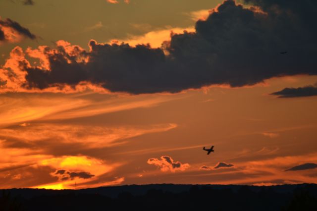 — — - Sunset flight near KMMK