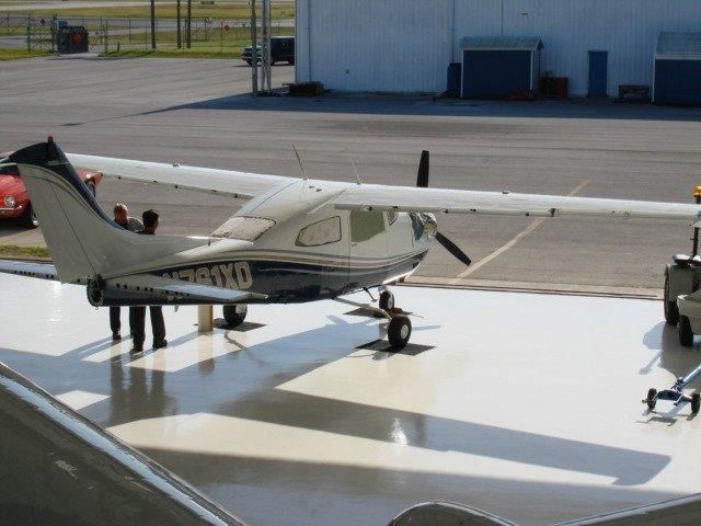 Cessna Centurion (N761XD) - Aircraft after paint scheme changed from red and white to white, blue, and gold.