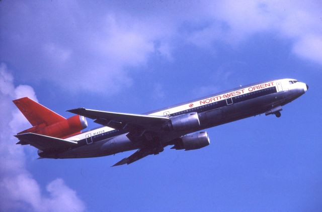 McDonnell Douglas DC-10 (N142US) - Northwest Orient DC-10-40 takes to the skies off rwy 23L at CLE