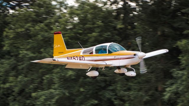 Grumman AA-5 Tiger (N45240) - Short final, near East end windsock