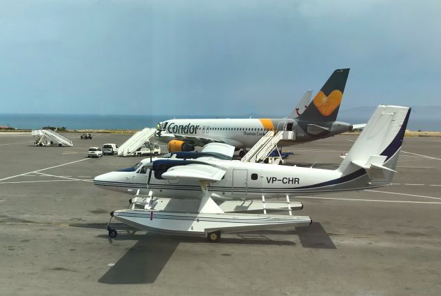 Beechcraft 19 Sport (VP-CHR) - Privately owned DeHavilland DHC-6-400 Twin Otter VP-CHR taxiing in on Heraklion Airport, Crete, Greece, seen from Gate A6 on 23d may 2019. 15 min later VP-CHP came in as well. Can't find exactly what VP stands for, probably lease/private owned? There seems to be a Aerospatiale Puma Helicopter with exactly the same tail code....