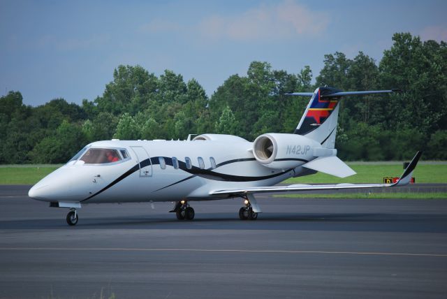 Learjet 60 (N42JP) - WELLS FARGO BANK NORTHWEST NA TRUSTEE (NASCAR driver Juan Pablo Montoya) returning from the Brickyard 400 at KJQF - 7/28/13