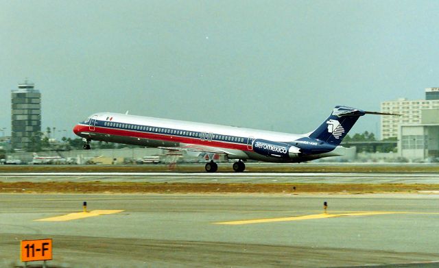 McDonnell Douglas MD-88 (XA-AMS) - LAX - 25L March 1989 I was in LAX for my first airline collectible show there. I had been tipped off of the 3-4 great places to film from south side of 25L. This was known as the " Fed Ex lot" a Ford pickup truck and an 8ft ladder in the back and I was not questioned once all weekend. When Aeromexico was on final in the cloudy skies I thought this was American Airlines at first, I was looking at other jets looked back and it was my first Aeromexico MD-88 photo, almost missed it. Those photo vantage points 1989 at Imperial Terminal parking lot, Fed Ex, east end of 25L lot and the view of the TBT from the parking structure were awesome, all now gone, everyone is left with "Cluttered Hill viewpoint" now.