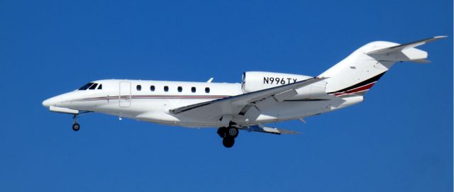 Cessna Citation X (N996TX) - About to touch down is this 2021 Cessna 750 Citation X in the Winter of 2024.