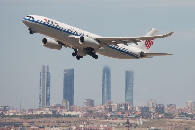 Airbus A330-300 (B-6131) - Departing from Madrid with the 4 towers as background.