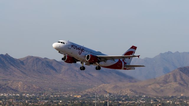 Airbus A319 (C-GBHO) - Air Canada Rouge A319 taking off from PHX on 9/3/22. Taken with a Canon 850D and Rokinon 135mm f/2 manual focus lens.