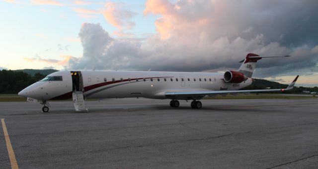 Canadair Regional Jet CRJ-700 (N520JG) - Joe Gibbs Racings Bombardier CL-600-2C10 CRJ-700 on the ramp at sundown at Anniston Regional Airport, AL - April 26, 2018.