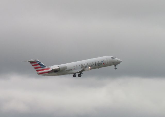 Canadair Regional Jet CRJ-200 (N425AW) - I was standing at the Airport Viewing Area at KCVG when I took the picture. 