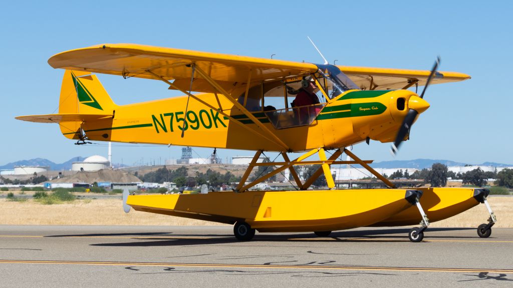 Piper L-18B Cub Special (N7590K) - 7590K heading out to the Clear Lake Sea Seaplane Splash and fly-in.