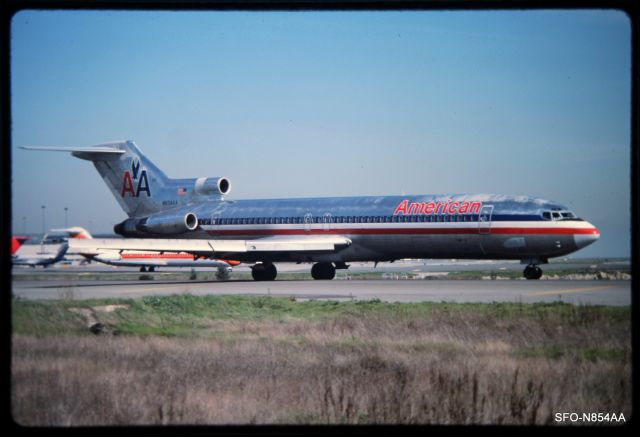 BOEING 727-200 (N854AA) - KSFO/SFO - early 1990s American 727 idling out to 1R for departure to DFW.