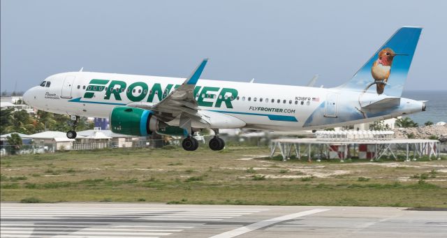 Airbus A320neo (N318FR) - Flower the humming bird landing at St Maarten. 21/08/21