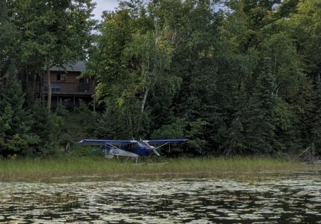 Douglas AD Skyraider (N325X) - "Just hanging out at the lake this weekend, what are you up to?"br /1989 Christen Industries Inc A-1