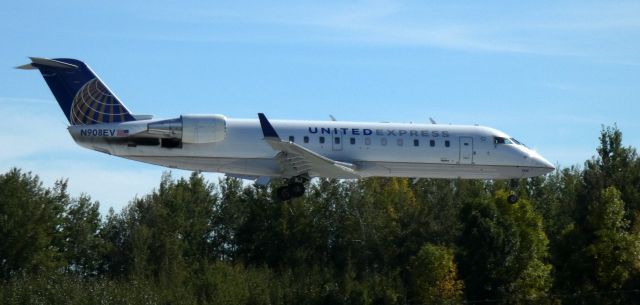 Canadair Regional Jet CRJ-200 (N908EV) - On final is this 2002 United Express Canadair Regional Jet 200ER from late Summer of 2021.