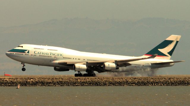 Boeing 747-400 (B-HUG) - This arrival of CX 870 into SFO marks the final scheduled flight into North America of a Cathay B744