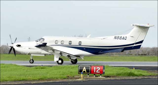 Pilatus PC-12 (N88AQ) - WINGSPAN 7 taking runway one-two at KMCE