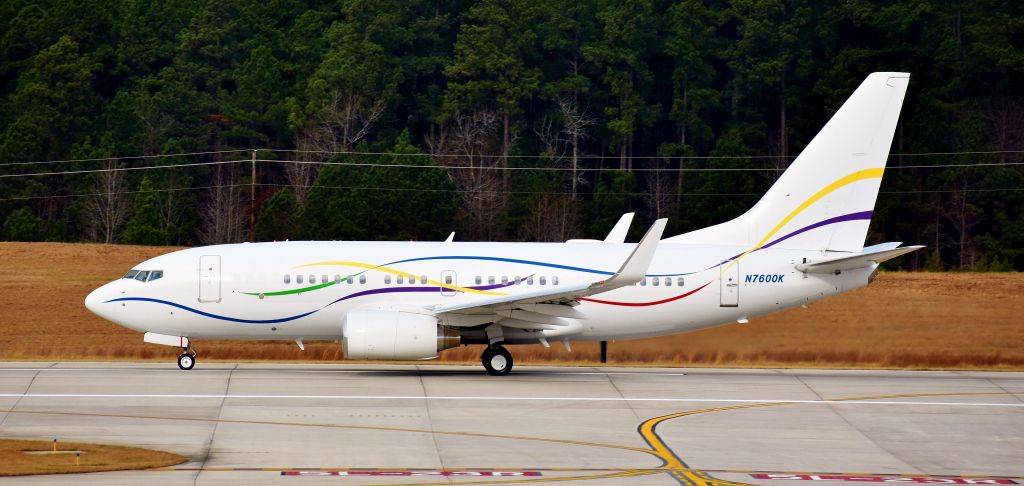 Boeing 737-700 (N7600K) - BEHOLD! The SAS Institutes BBJ, leaving for parts unknown. The most eclectic airplane youll ever see at RDU.  Its always fun to see her - my favorite livery on any privately owned/genav bird.  A Christmas Eve Eve present, appropriately festive, 12/23/17.