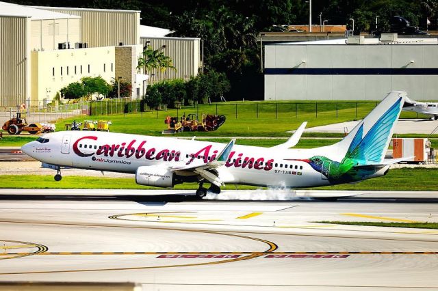 Boeing 737-800 (9Y-TAB) - Caribbean Airlines - Air Jamaica 9Y-TAB Seen burning some rubber on RWY 27R, Fort Lauderdale. Courtesy Rob Starling ©